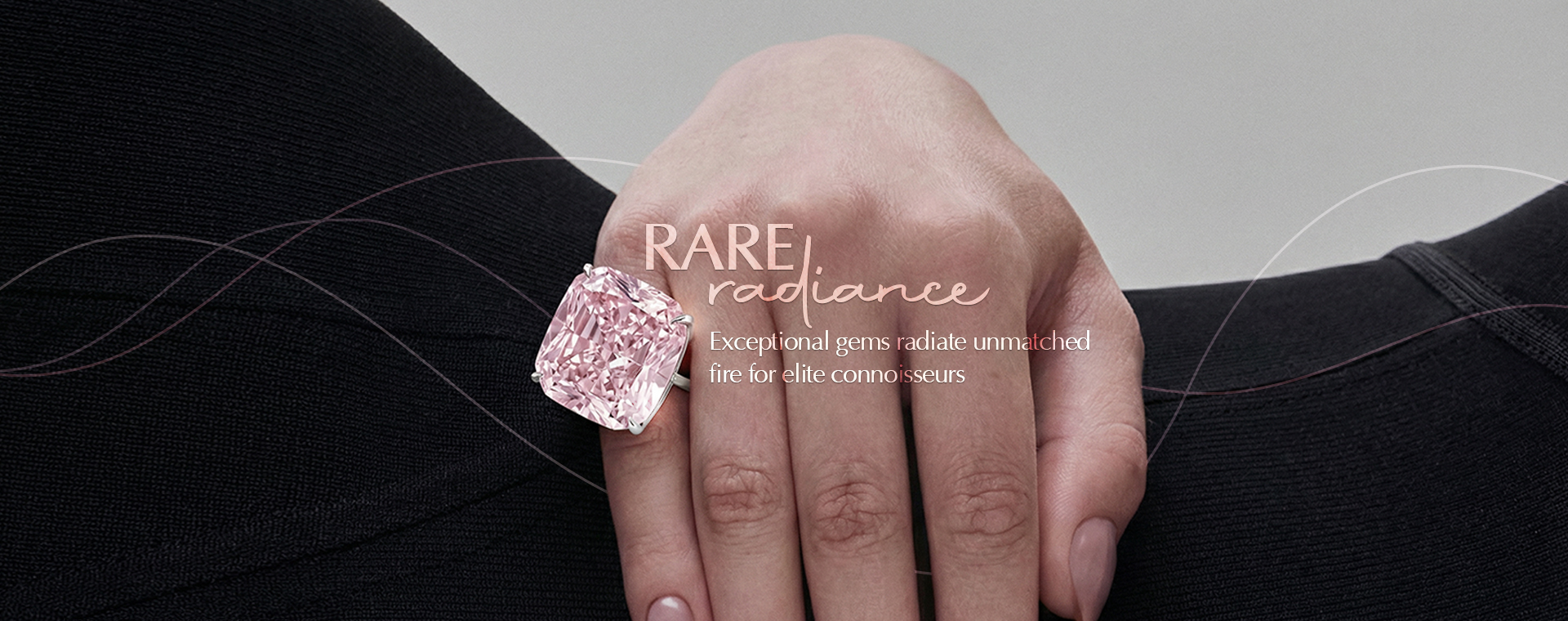 Rare Radiance — a fancy pink cushion diamond ring worn on the hand